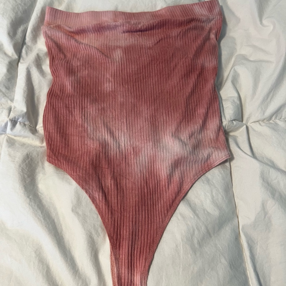 Tube top body suit. Worn a few times, very comfortable.